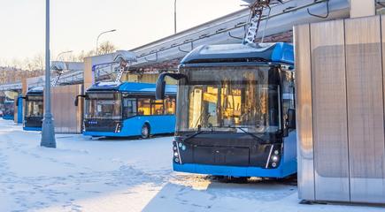 Electric buses charging at the end of a route
